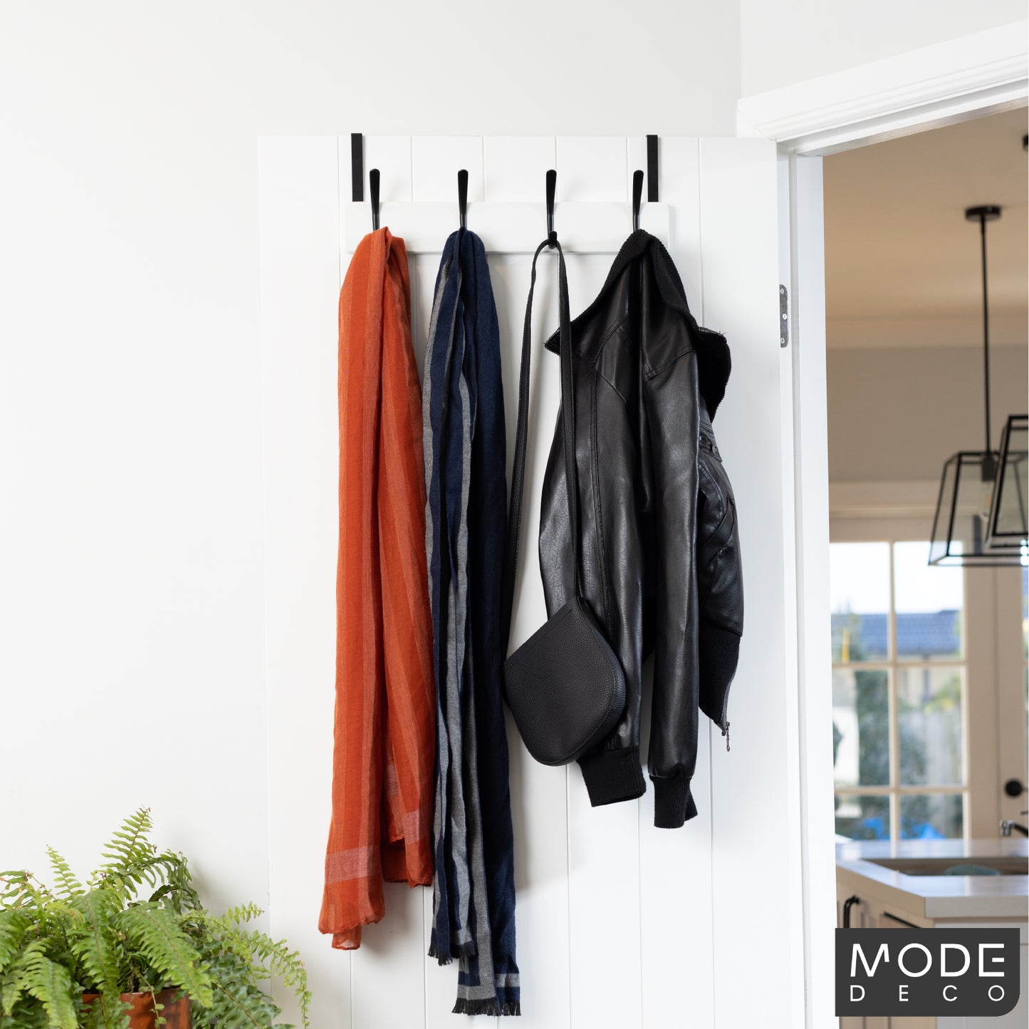 4 Black Hooks on White Board Over Door Hook