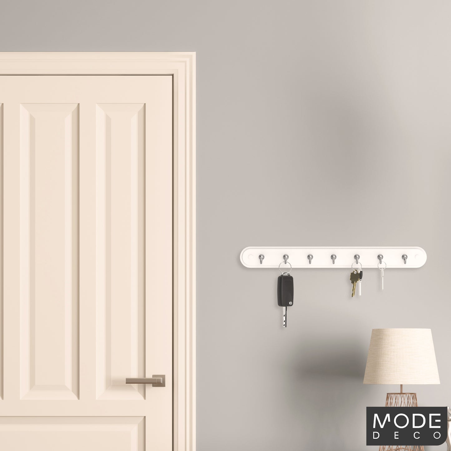 7 Chrome Hooks on White Board Key Rack