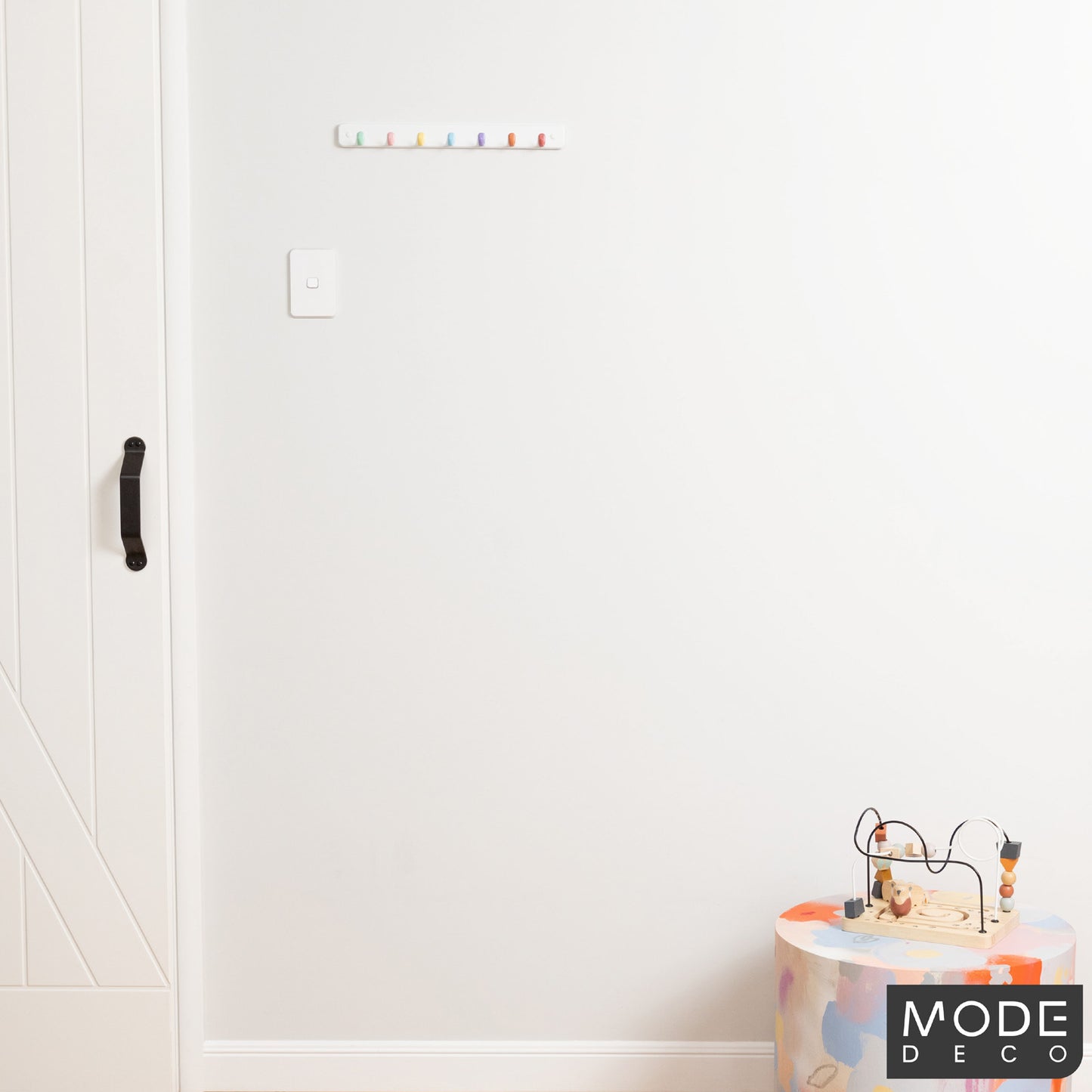 7 Pastel Hooks on White Board Key Rack